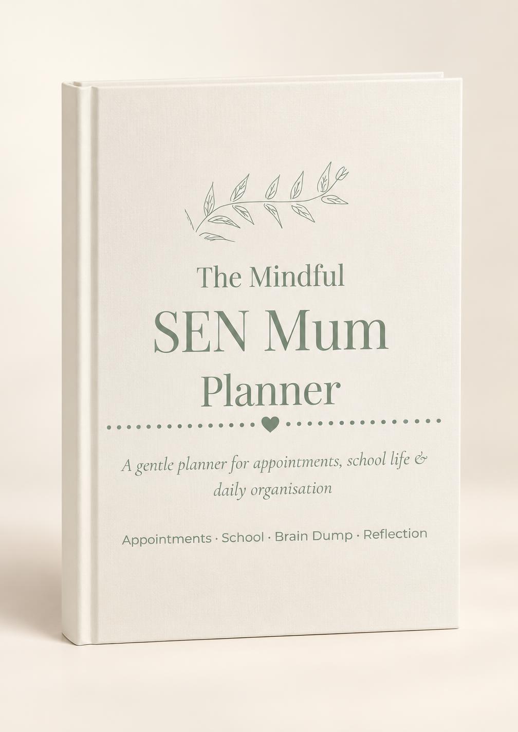 The Mindful SEN Mum Planner hardcover standing upright on a soft ivory backdrop